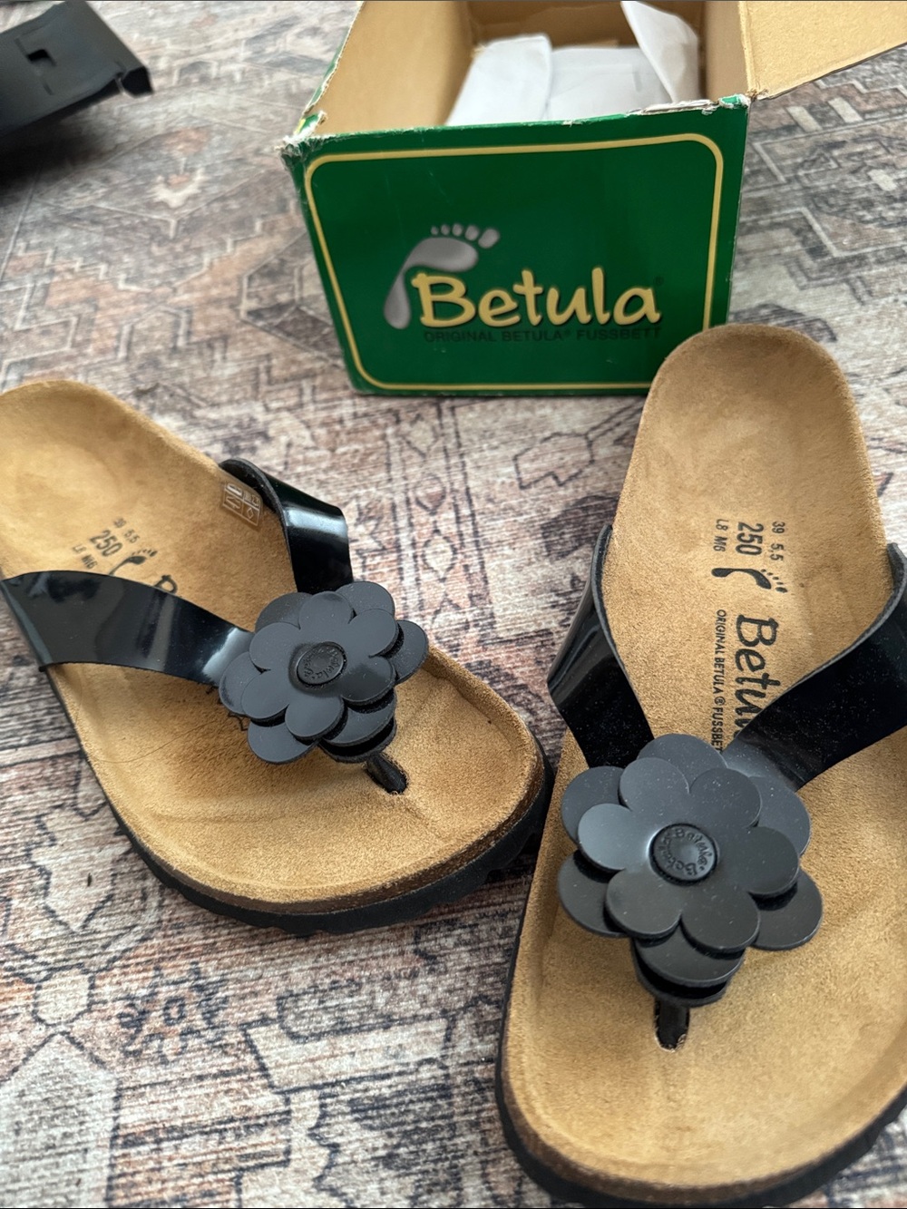 Betula Women’s Black Floral Toe-Post Sandals